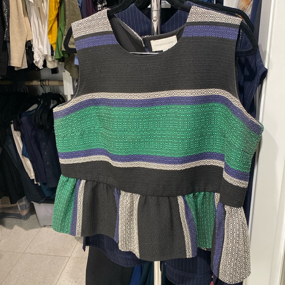 Peplum sleeveless top